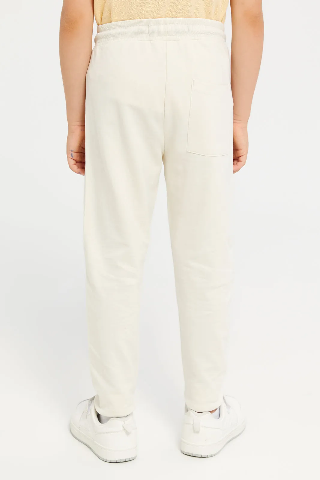 Boys Cream Printed Jogger Pants